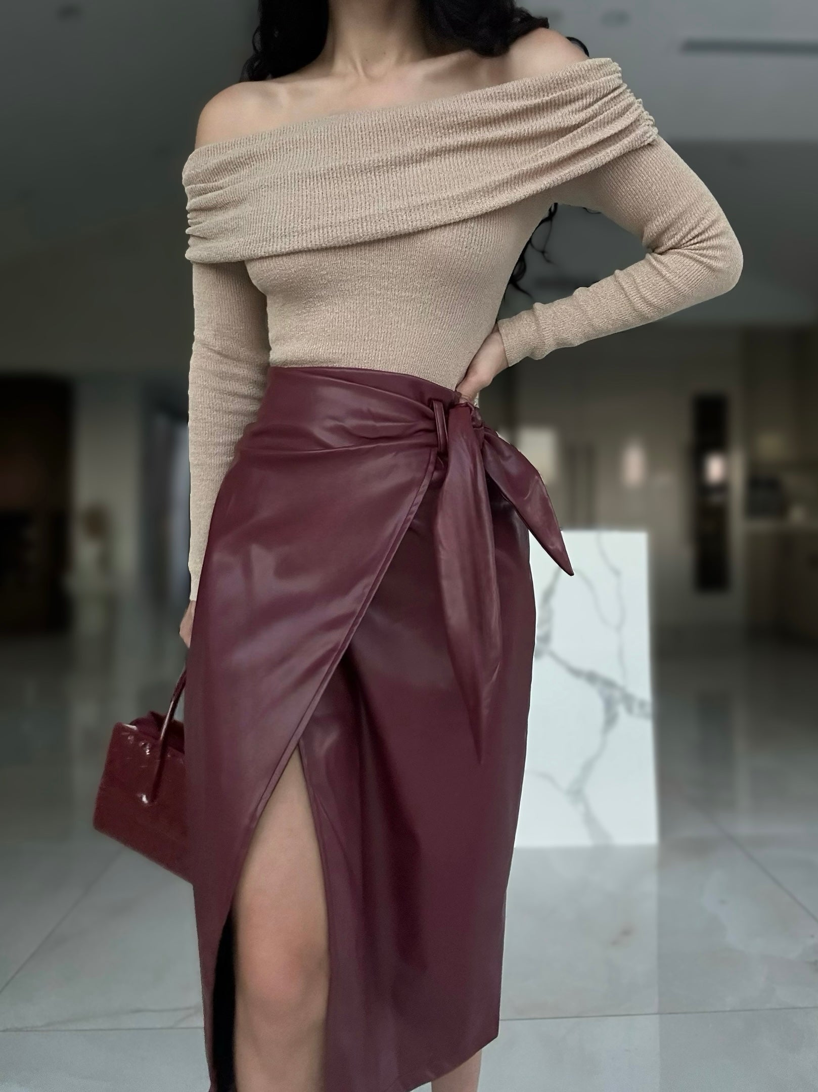 ‘AMIRA' PU leather wrap skirt